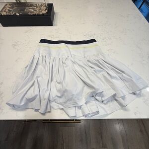 White Wilson tennis skirt with black/yellow